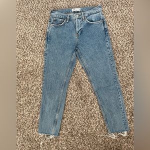Zara Mid rise, medium wash, straight leg jeans with raw hem. Size 4